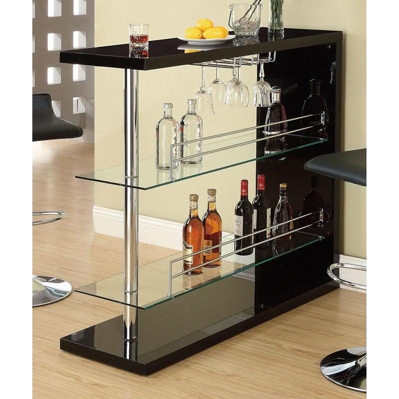Entertain in style with the sleek contemporary bar unit featuring 2 glass storage shelves and a wine glass holder. The unit is finished in a gloss black and topped off with chrome accents.